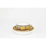 A SEVRES STYLE CUP AND SAUCER DATE CODE FOR 1792 painted with a central circular fan inside a border