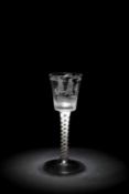 A RARE 'PRIVATEER' OPAQUE-TWIST WINE GLASS C.1760 the slightly flared bucket bowl engraved with a