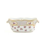 A SEVRES SEAU A LIQUER DATE CODE FOR 1769 the oval body painted with rose sprigs beneath a border of