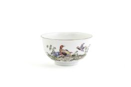 A CHELSEA TEABOWL C.1755 painted with colourful birds amongst foliage, the reverse and interior with