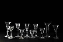 A COLLECTION OF TEN DRINKING GLASSES MAINLY 18TH AND 19TH CENTURY comprising: one with a tapering