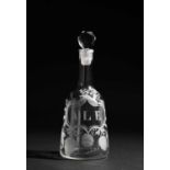 AN ENGRAVED GLASS DECANTER AND STOPPER C.1765 of sugarloaf form with a facted stopper, engraved '