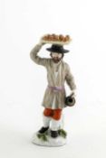 A MEISSEN 'CRIS DE ST PETERSBURG' FIGURE OF A RUSSIAN PEASANT AFTER PETER REINICKE, C.1750 of a