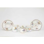 A GROUP OF SIMILARLY DECORATED SEVRES PORCELAIN C.1770-80 AND LATER painted with floral sprigs