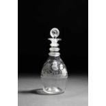 AN IRISH GLASS DECANTER AND STOPPER C.1810-20 of Prussian form, engraved with a three-masted ship at