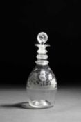 AN IRISH GLASS DECANTER AND STOPPER C.1810-20 of Prussian form, engraved with a three-masted ship at