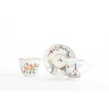 A CHELSEA FLUTED BEAKER OR TEABOWL C.1755 AND LATER later painted with flower sprays, together