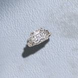 AN ASSCHER-CUT DIAMOND RING