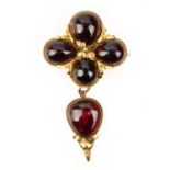 A VICTORIAN GARNET-SET GOLD BROOCH