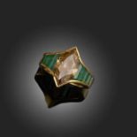 POIRAY, A FANCY DEEP BROWN YELLOW DIAMOND AND EMERALD RING