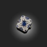 AN ART DECO STYLE SAPPHIRE AND DIAMOND RING