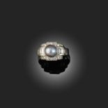 AN ART DECO NATURAL PEARL AND DIAMOND RING
