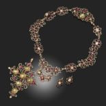 A LATE 18TH CENTURY GARNET AND PEARL DEMI-PARURE
