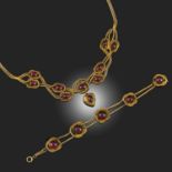 A VICTORIAN GARNET-SET GOLD DEMI PARURE, 19TH CENTURY AND LATER