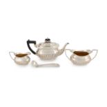 A matched late-Victorian silver three-piece tea set,