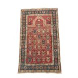 A KHARABAGH PRAYER RUG