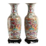 A PAIR OF CHINESE CANTON FAMILLE ROSE BALUSTER VASES