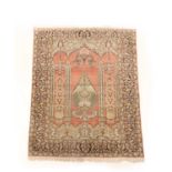 A KASHAMIR SILK PILED PRAYER RUG