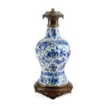 A DUTCH DELFT BLUE AND WHITE BOTTLE VASE TABLE LAMP