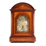 AN EDWARDIAN THREE TRAIN CHIMING BRACKET CLOCK WITH BRACKET