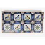 A SET OF EIGHT DELFTWARE POLYCHROME TILES