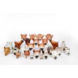 A COLLECTION OF EIGHTEEN STAFFORDSHIRE FOX HEAD STIRRUP CUPS