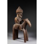 A NURISTAN GANDAU EQUESTRIAN FIGURE