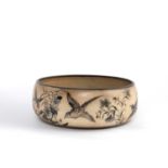Martin Brothers, A large stoneware bowl by Robert Wallace Martin