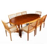 Robert Heritage (1927-2008) for Archie Shine, a walnut veneered dining table and eight chairs