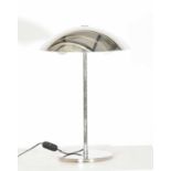 In the manner of Poul Hennigsen (1894-1967), A chrome table lamp