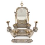 A Persian metalware and gilded electroplated suite of items,