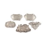 A collection of antique silver wine labels,