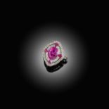 AN ART DECO RUBY AND DIAMOND CLUSTER RING