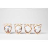 A SET OF FOUR MEISSEN BEAKERS