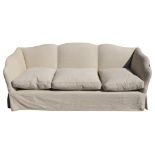 A good quality sofa in the country house style with a shaped outline and loose cushions. Two