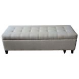 An upholstered box ottoman with buttoned hinged lid, 40 cm x 130 cm x 46 cm