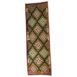 A Maimana kilim runner with white geometric detail. 193cm x 64cm.