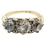 An Edwardian style three-stone diamond ring, set with three graduating old-cut diamonds, the central