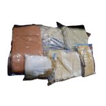 A collection of four good quality patterned bedspreads for both single and double beds, pure wool