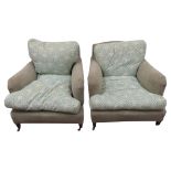 A pair of Howard & Son drawing room chairs with a later upholstered finish and original monogramed