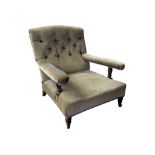 An Edwardian low mahogany open elbow chair by Howard & Sons, with buttoned back and fixed covers,