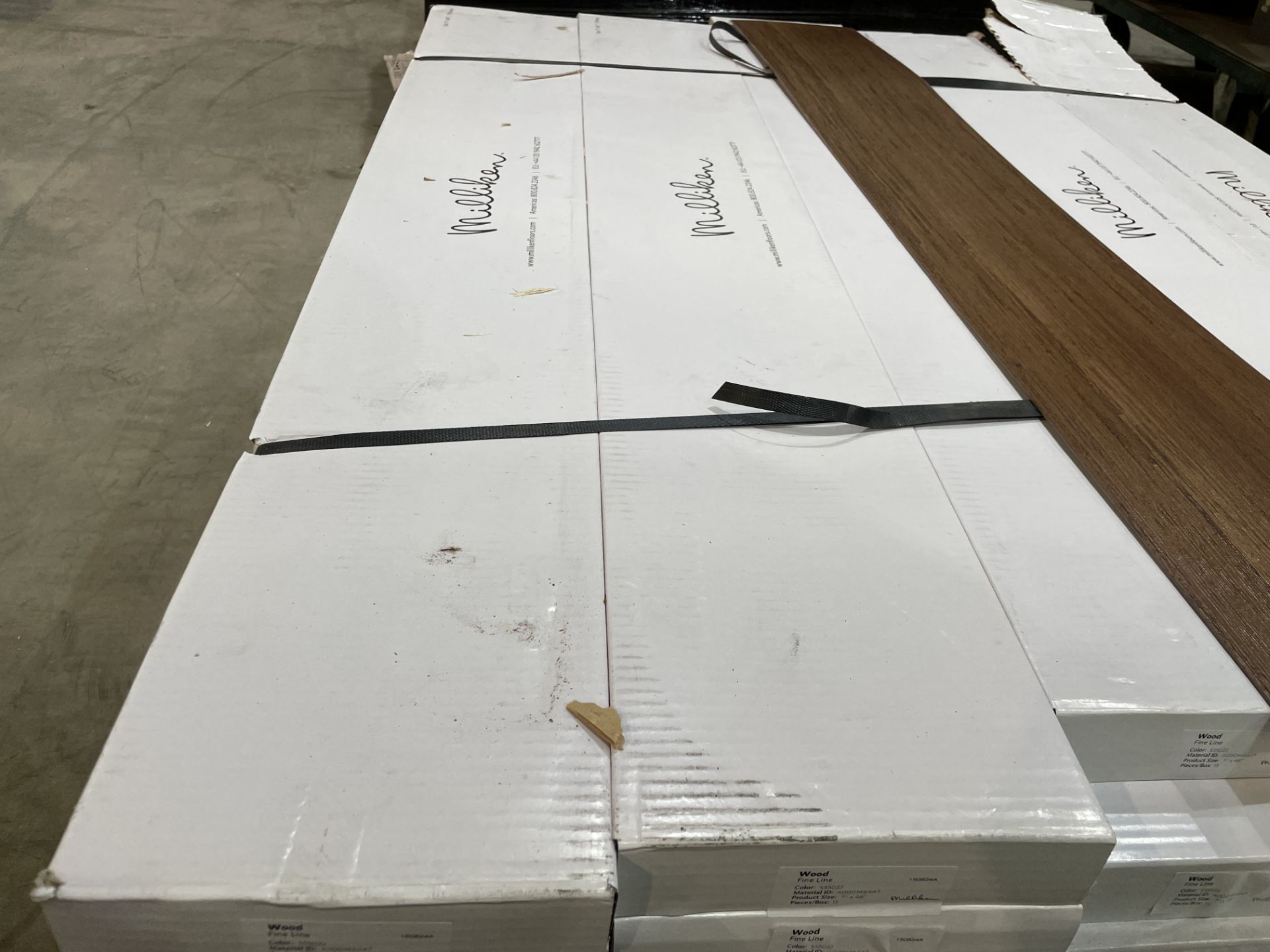 11 x New Packs of Milliken Wood – Fine Line Luxury Vinyl Plank Flooring. RRP £85.27 per pack. Each