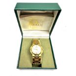 Vintage gold-plated Gucci 9200M quartz watch with a white/gold dial and a date function. box and