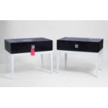 A pair of contemporary bedside tables and a matching side table Modern