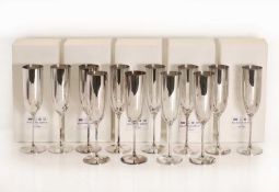 A collection of twelve silver champagne flutes