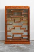 A Chinese hardwood deity display cabinet 20th century