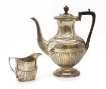 A Victorian silver coffee pot,