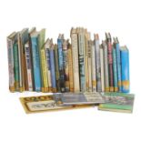 A quantity of motorcycle and motoring reference books, 20th century,