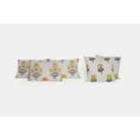 A set of five cushions by Birdie Fortescue, of recent manufacture,