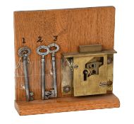An Aubin's Patent A1 Guardian Safe Lock, with triple action and three keys numbered 1, 2 and 3, each
